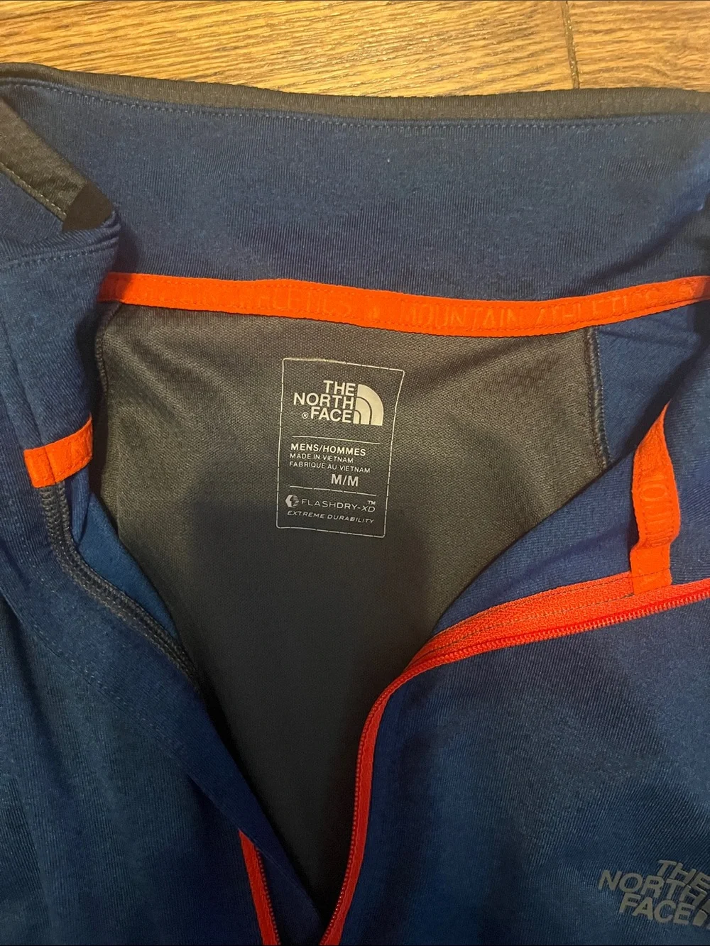 The North Face Men's Navy Half-Zip Pullover with Orange Trim